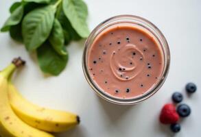 Smoothie with Strawberries, Spinach, and Banana photo