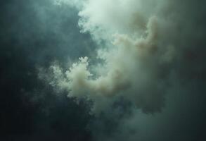 A photo of a cloud with smoke coming out of it