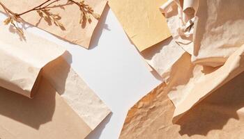 Paper background with brown crumpled paper and twigs photo