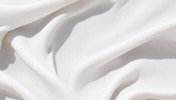 A white fabric with folds and folds photo