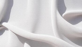 A white fabric with a pattern of wavy lines photo
