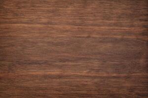 dark wood texture in walnut color. empty surface rustic table background. mahogany template for design photo