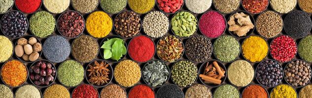 Spices and herbs background. Large set of seasoning top view. Colorful condiments for label prints or site caps photo
