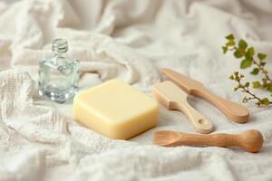 Soap bar wooden tools glass bottle natural spa setting photo