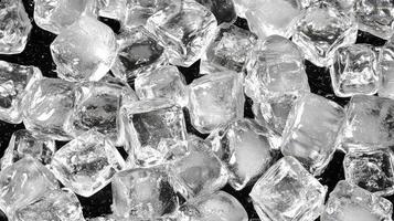 Crystalline Coolness A CloseUp of Ice Cubes on Dark Surface Fresh Refreshing photo