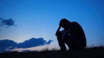 Silhouette of Sadness A Portrait of Depression Under a Dusky Sky photo
