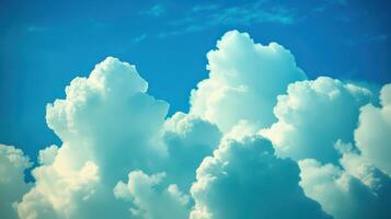 Fluffy White Clouds Against a Bright Blue Sky Dreamy Cloudscape with a Serene Atmosphere photo