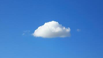 A Single Cloud Drifting in the Azure Sky Simplicity Purity Untroubled Serenity Under the Open Skies photo
