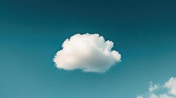 Solitary Cloudscape A Single Cloud Against a Teal Skys Backdrop photo