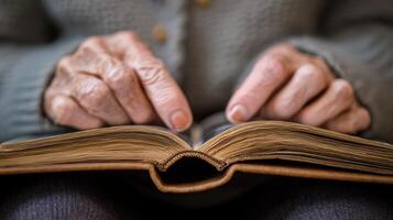 Aged Wisdom Hands Reading Old Book Intimate Study Focus on Legacy and Learning photo