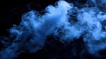 Ethereal Blue Haze A Dance of Smoke and Shadow on a Dark Canvas, evoking mystery and atmosphere photo
