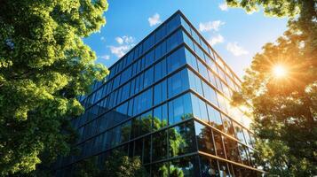 Modern Glass Building Nature Reflecting Urban Architecture and Bright Sunlight photo