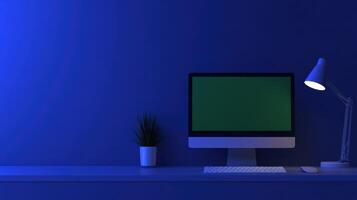Minimalist Desk Setup Green Screen and Cozy Blue Lighting for Focus and Inspiration in a Digital Workspace photo
