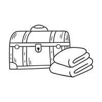 A trunk box next to folded blankets vector