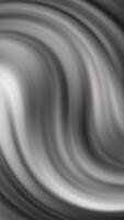 Grayscale black and white abstract background of blurred wavy lines. Suitable for modern design projects. Ideal for web backgrounds or digital presentations. video