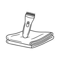 A beard trimmer on a folded towel vector