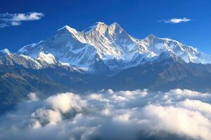 a mountain range is seen in the clouds photo