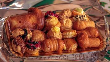 Assorted Italian pastries on a tray. photo