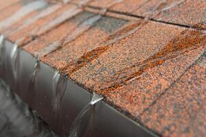 Demonstration of the properties of bitumen tiles in the showroom photo