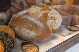 Fresh bread on a counter of the grocery store photo