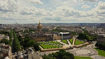 Architectural complex and park area of Les Invalides in the historic center of Paris, bird's eye view on a cloudy day. Cityscape of Paris from drone, France - historic photo