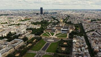 Architectural complex and park area of Les Invalides in the historic center of Paris, bird's eye view on a cloudy day. Cityscape of Paris from drone, France - Invalides photo