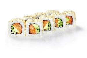 Delicious sushi rolls with salmon, avocado, and cucumber sprinkled with sesame seeds on white background photo