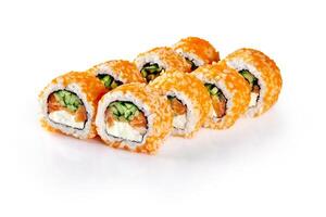 Sushi rolls with red tobiko caviar, salmon, cucumber and cream cheese lying on white reflecting table photo