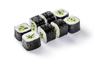 Kappa maki sushi rolls with cucumber and rice filling on white background photo