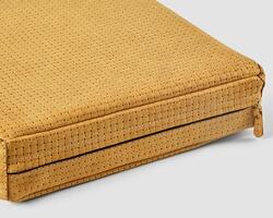 Close-up of stylish yellow woven leather bag showing intricate details and craftsmanship photo