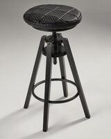 Black swivel bar stool with woven leather seat on gray background photo