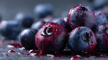 Burst of blueberries fills the entire frame with vibrant colors and rich textures highlighting their freshness photo