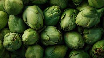 Pile of fresh artichoke hearts showcasing their vibrant green color and soft texture ready for cooking photo