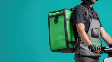 Food delivery person prepares to secure a green delivery bag for transportation in urban area photo