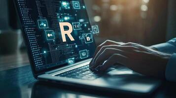 Coding with R Language on Laptop Display with Hand Typing, Software Development and Data Science photo
