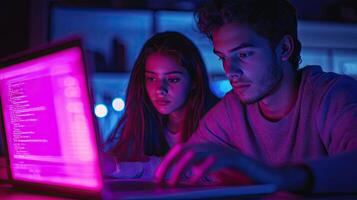 Couple Coding Together at Night Focused Programmers, Laptop Screen, Modern Workspace, Collaboration, Teamwork, Innovation photo