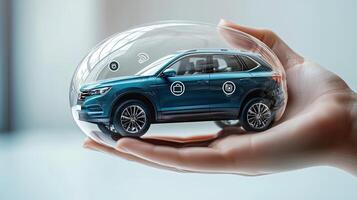 Modern Teal Car Protected in a Bubble Held in Palm of Hand, Future of Mobility and Safety photo