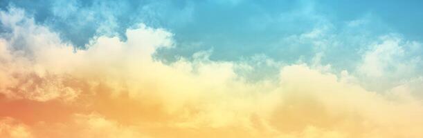 A mesmerizing gradient of blues and yellows illuminates wispy clouds in the expansive sky photo