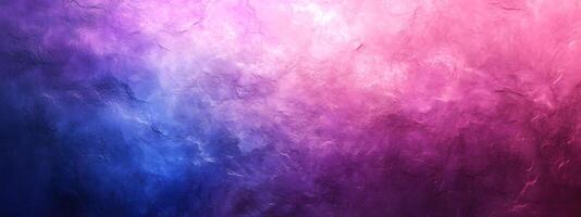 Abstract background showcases a textured surface with a vibrant gradient from pink to blue photo