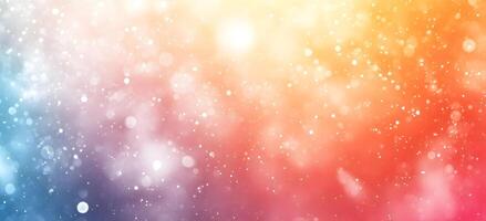 Colorful sparkling bokeh lights cascade through a blurred gradient background of blues, yellows and reds photo