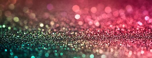 Colorful sparkling glitter bokeh gradually transitions between pink and turquoise hues in a mesmerizing blurred pattern photo