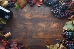 Dark wood table showcases grapes, wine bottle, and colorful leaves, creating a rustic backdrop photo