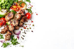 Delicious meat skewers are displayed beside colorful herbs and grilled vegetables on a bright background photo