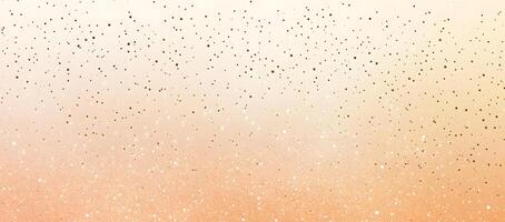 Gold glitter dots fall against a pale peach gradient background creating a sparkling effect photo