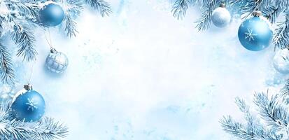 Snow covered branches create an elegant frame with hanging Christmas ornaments that sparkle photo