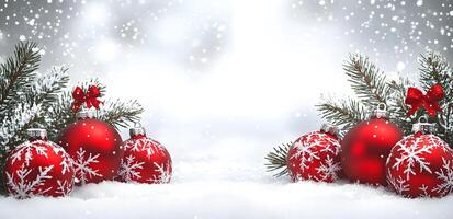 Snowy fir branches and red baubles create a festive holiday with snowflakes photo