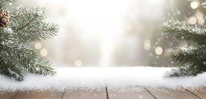 Snow covered spruce branches with pine cone on wooden surface provide winter holiday atmosphere photo