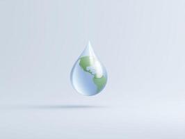 A water drop with a globe inside it photo