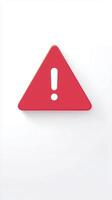 A red triangle with an exclamation sign on it photo