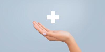 Hand gesture with palm facing up, displaying a white medical cross symbol above, representing healthcare, support, and assistance in a clean, minimalistic environment photo